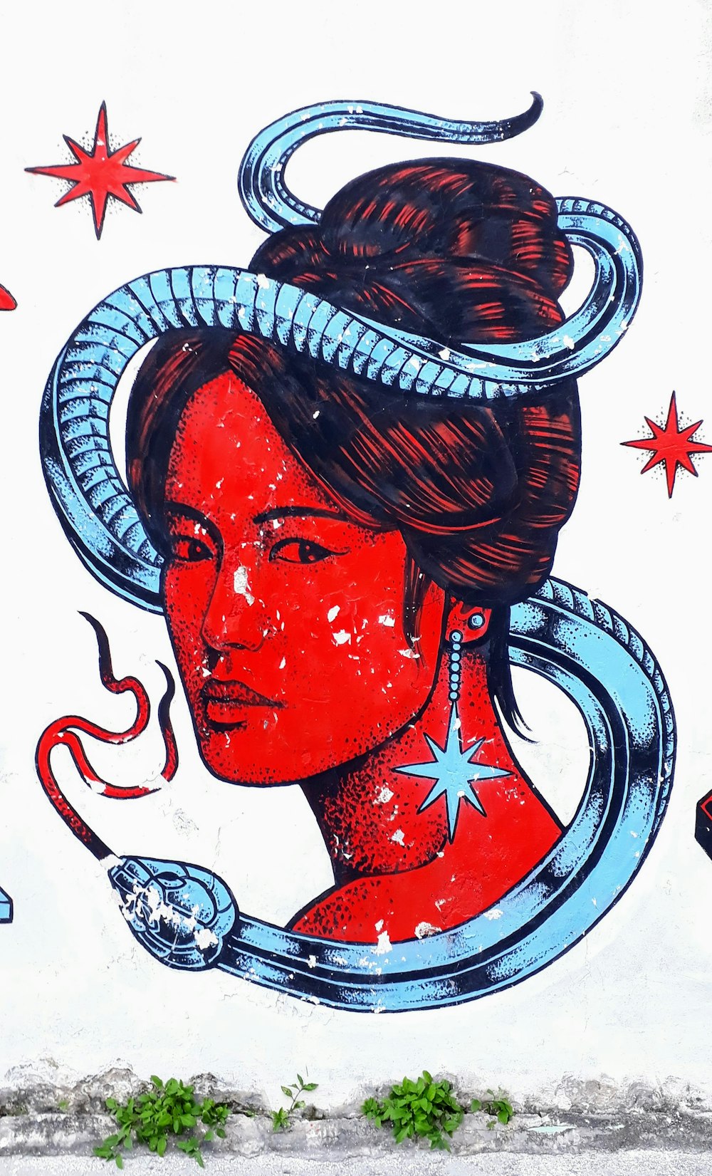 red and blue woman face illustration