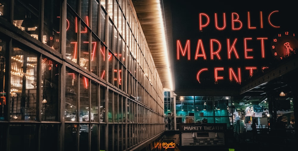 a public market center lit up at night