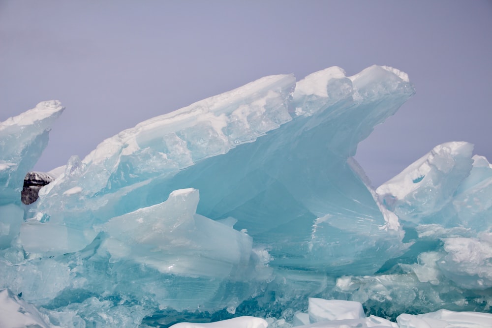 ice formation on body of water during daytime