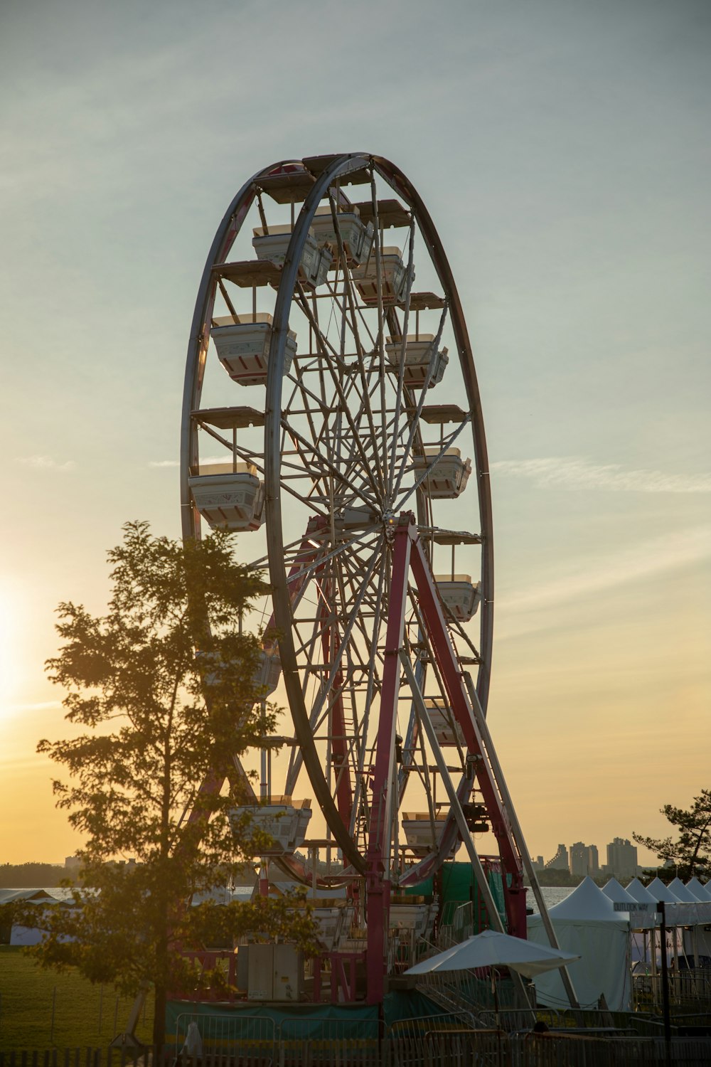 black ferris wheel under blue sky during daytime