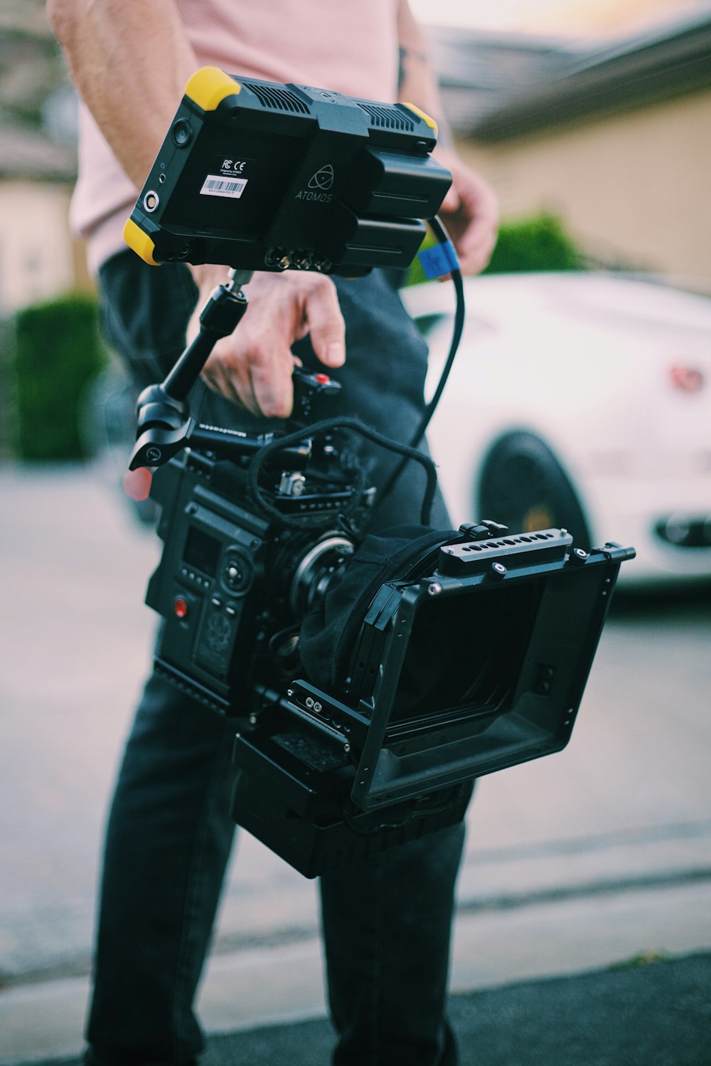 person holding black dslr camera