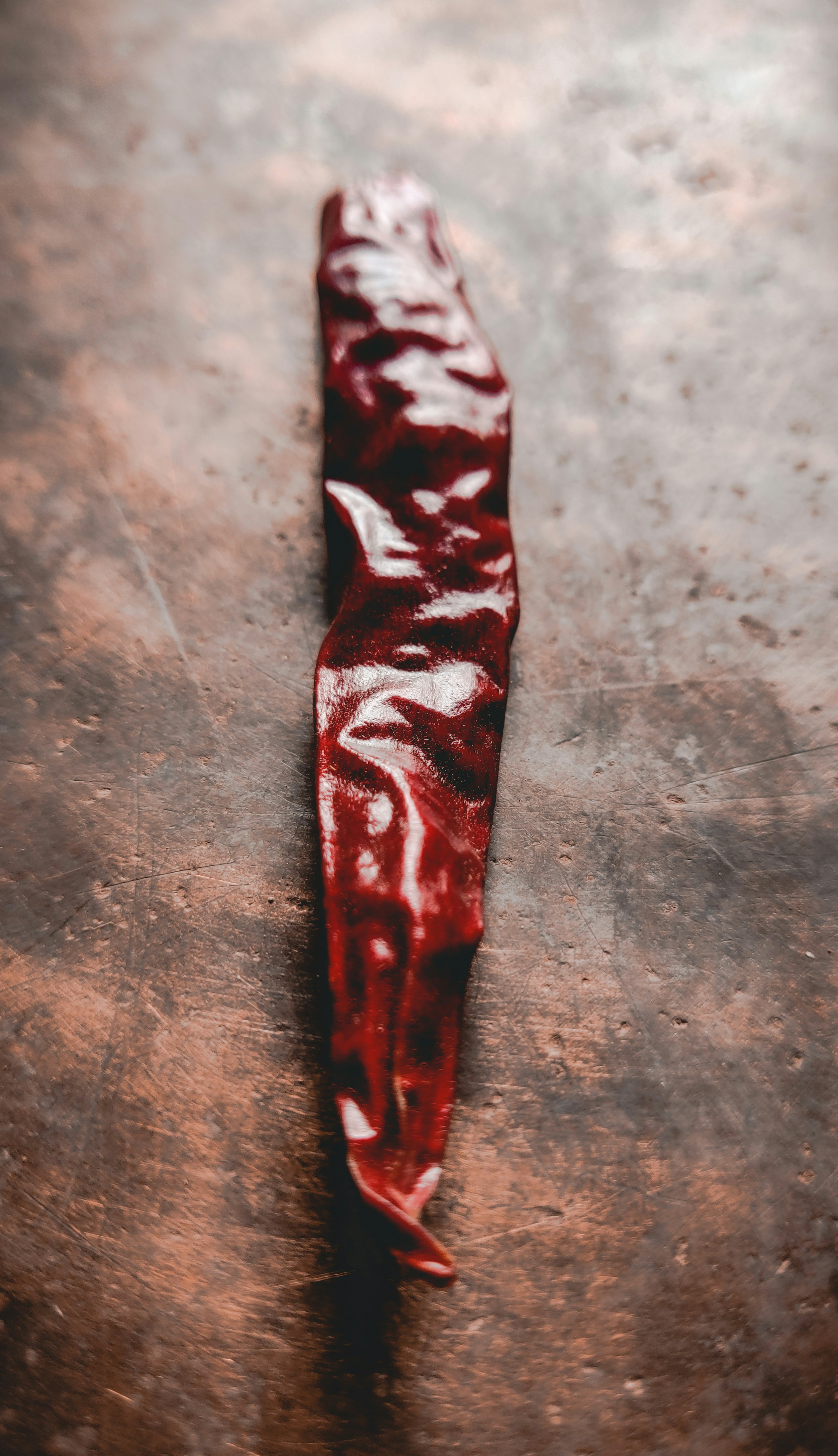 red and white textile on brown wooden table