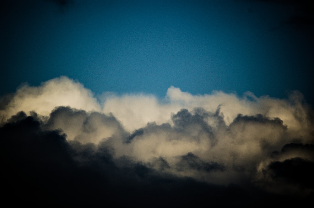 white clouds on blue sky