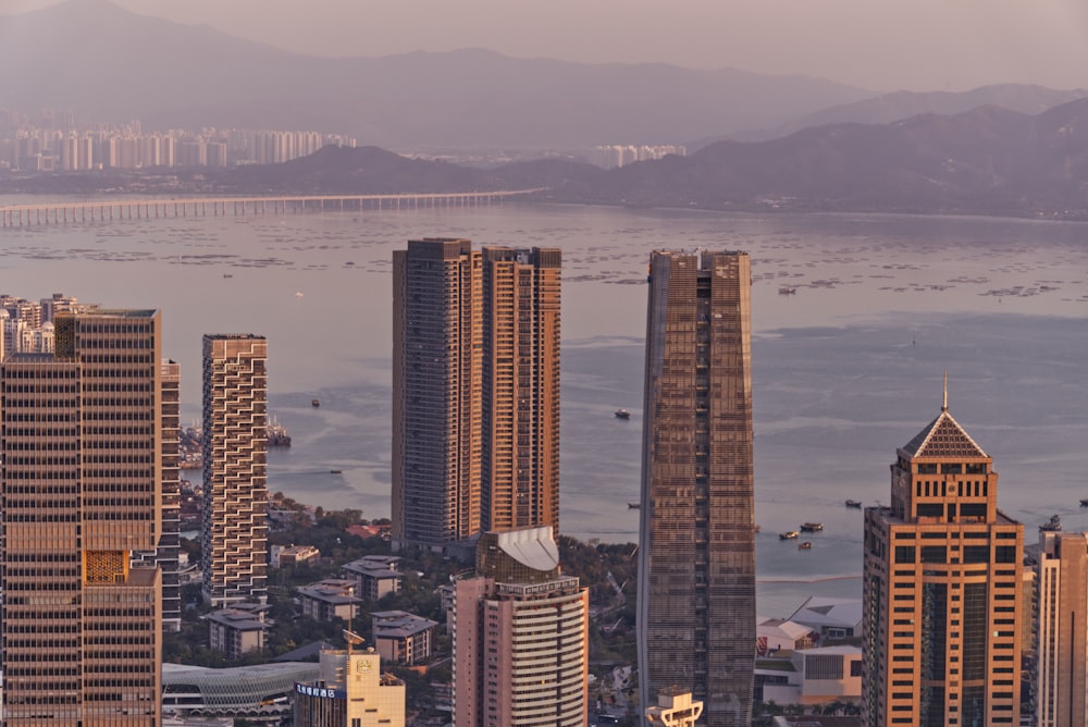 high rise buildings near body of water during daytime