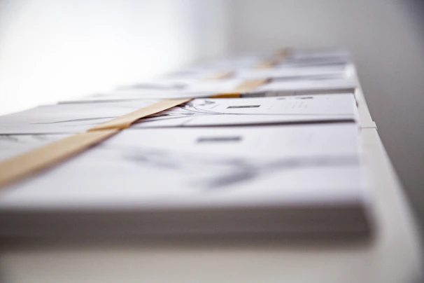 Close-up of legal books and documents neatly arranged on the office desk.