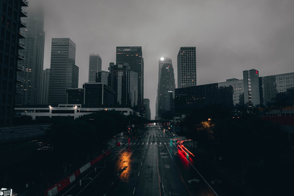 a city street with a lot of tall buildings