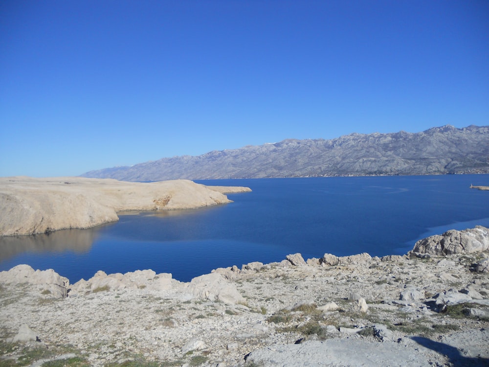 a large body of water surrounded by mountains