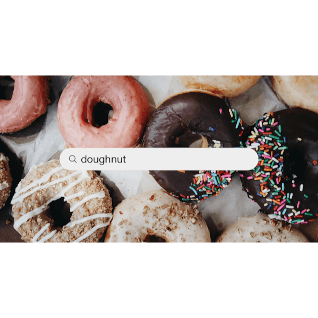 A pile of glazed donuts sitting on top of a table photo – Donut Image on  Unsplash