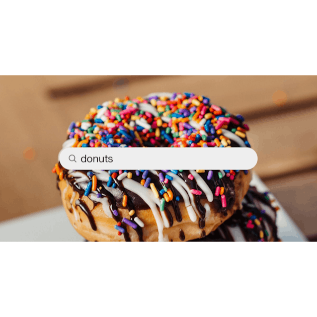 A pile of glazed donuts sitting on top of a table photo – Donut Image on  Unsplash