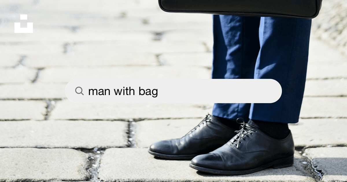 Man sitting on stairs with red Louis Vuitton X Supreme leather duffel bag  photo – Free Accessories Image on Unsplash