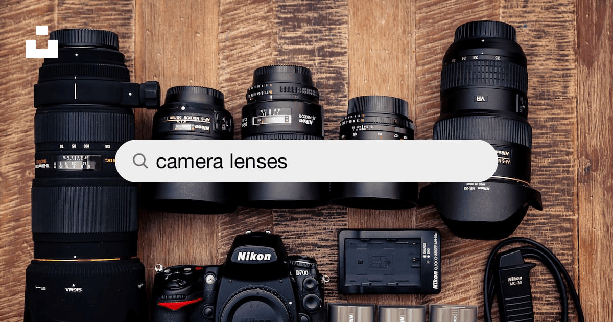 Nikon lenses on a table.