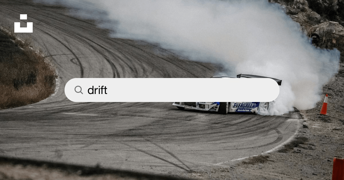 Premium Photo  Red racing car drift on the track, dust from under the  wheels. art illustration, motion blur