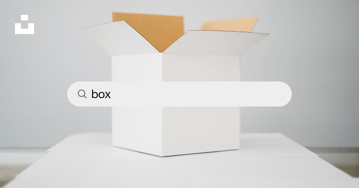 A couple of boxes sitting on top of an open book photo – Free Flatlay Image  on Unsplash