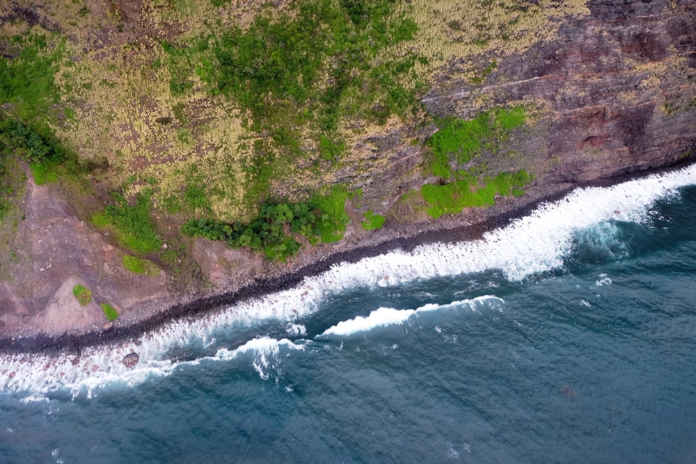 aerial view of seashore near land