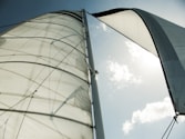 white sail boat