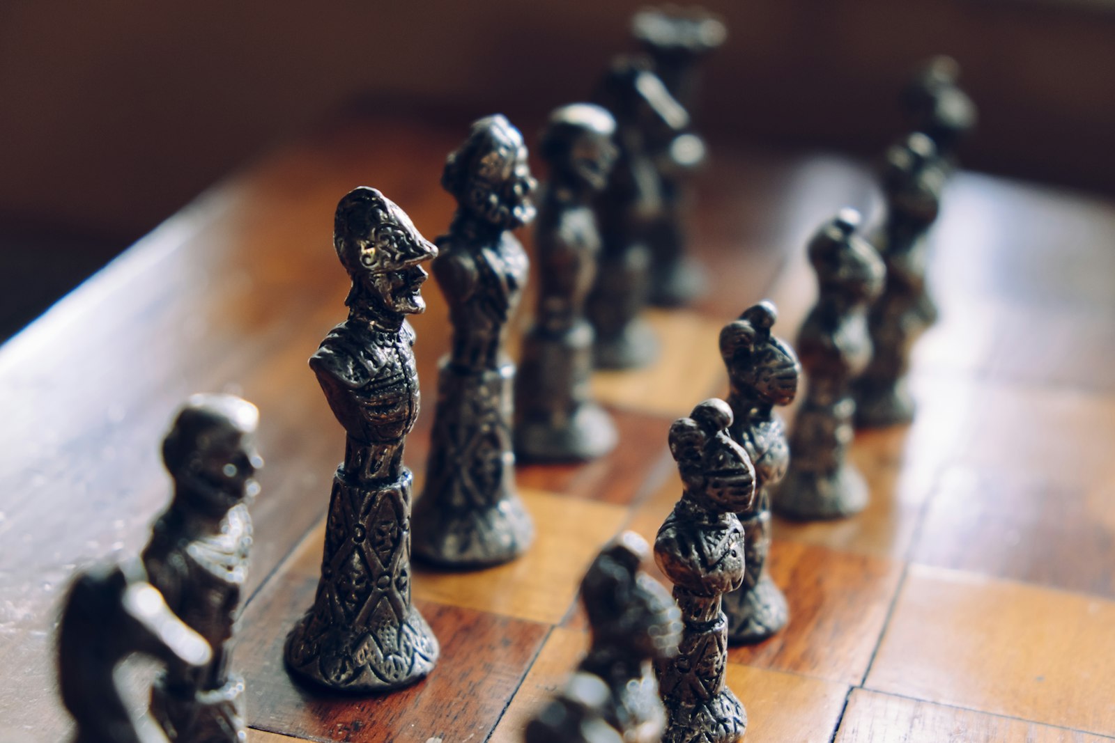 Fujifilm X-E2 + Fujifilm XF 18-55mm F2.8-4 R LM OIS sample photo. Chess pieces on wooden photography