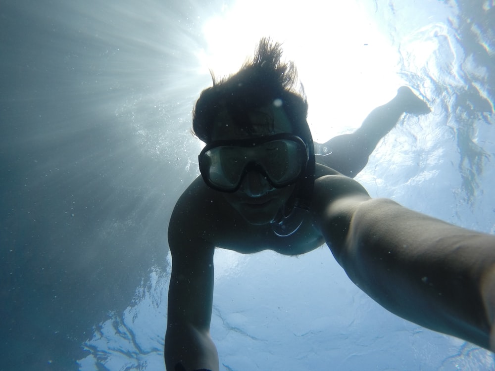 man swimming underwater