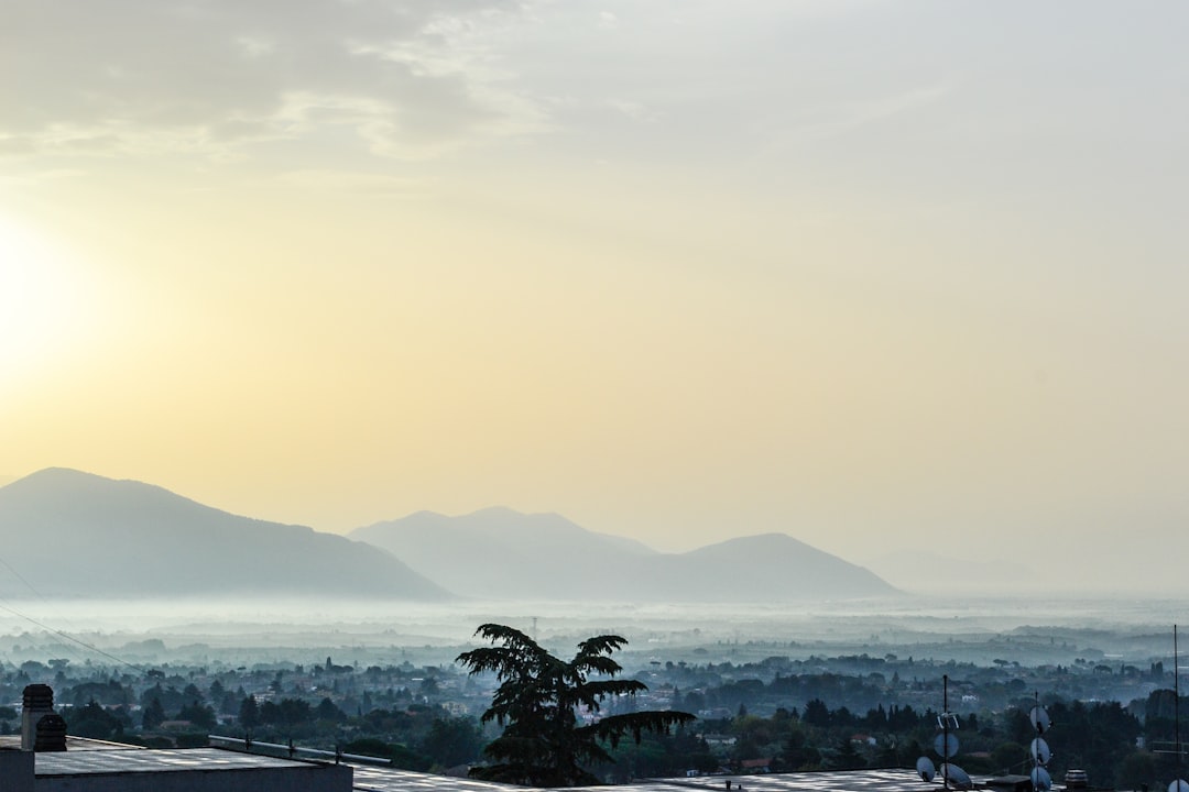 fog covering the mountains and city