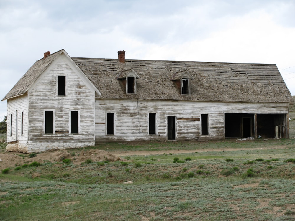 photography of white and grey house