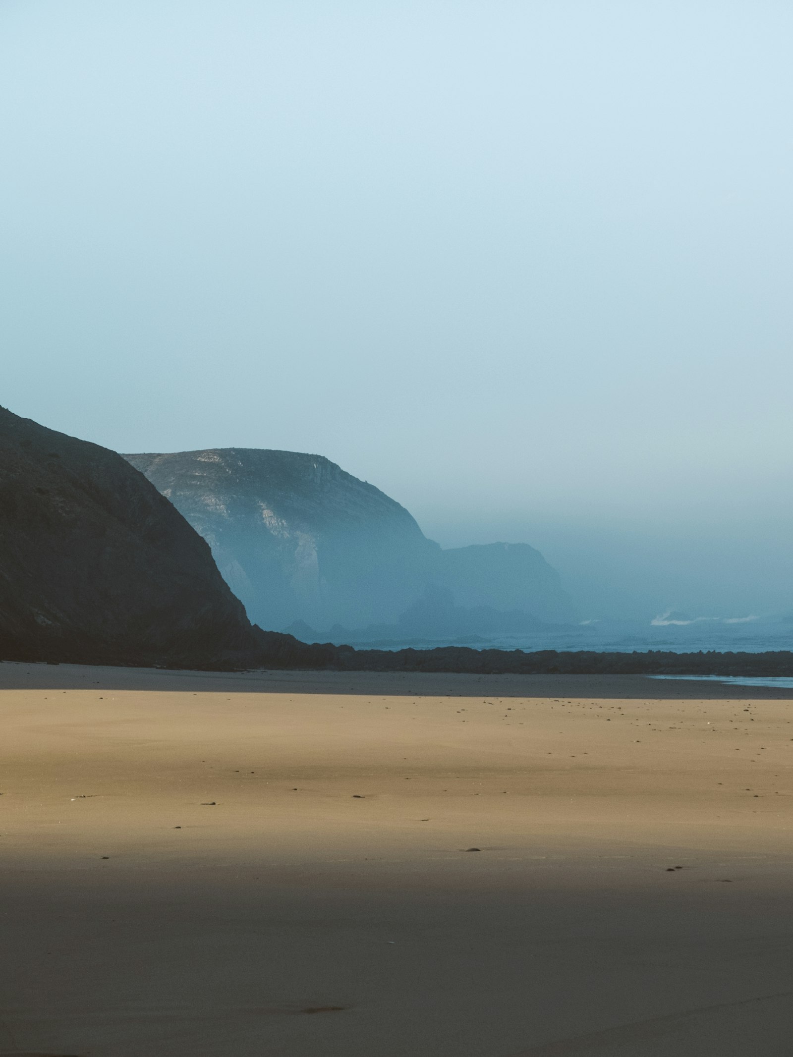 Fujifilm X20 sample photo. Mountain covered with smoke photography