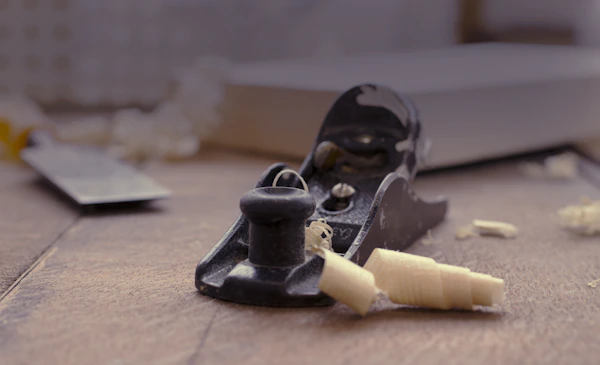 Hand plane and chisel used for precise joinery