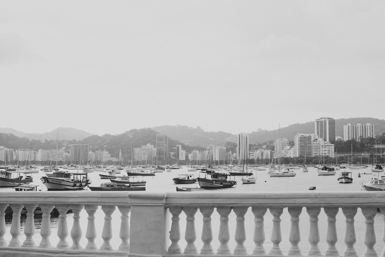 Canon EOS 5D Mark II + Canon EF 50mm F1.4 USM sample photo. Grayscale photo of boats photography