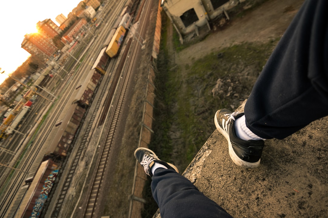 person sitting on rooftop