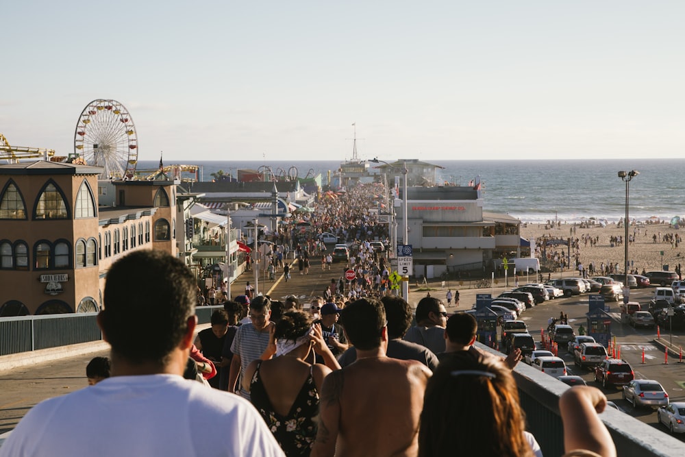 group of people walking in the road