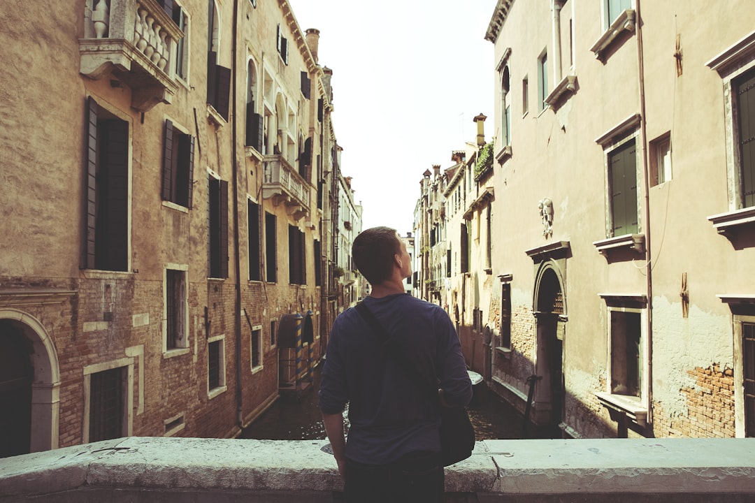 man standing in bridge, Male tourist enjoying the view in Venice