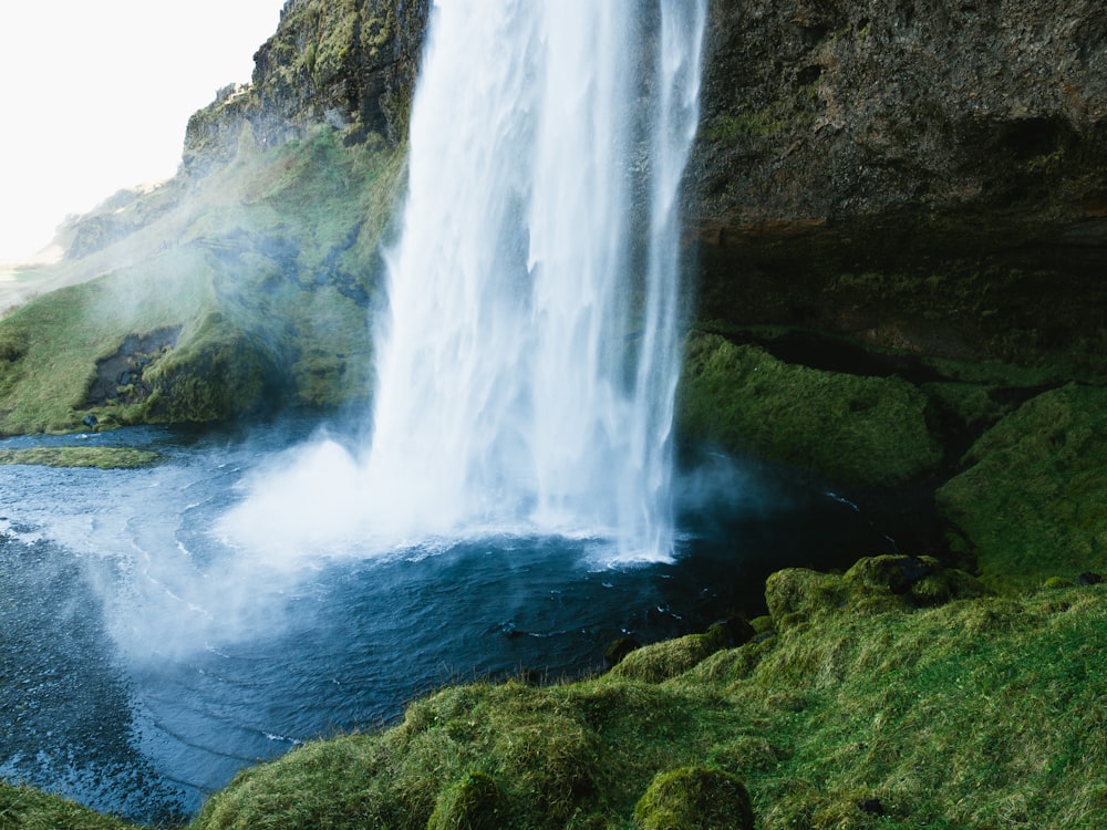 time lapse photography of waterfalls