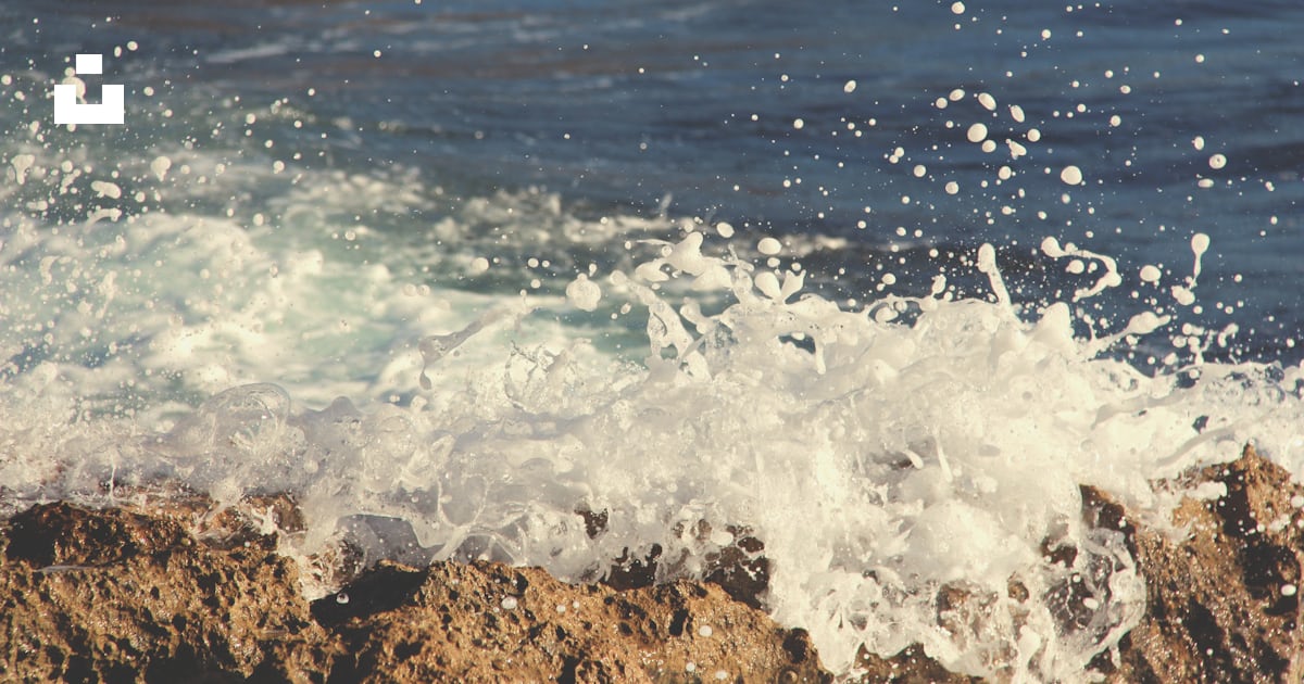 Photo of sea wave bump into boulder photo – Free Sea Image on Unsplash