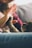 tabby cat touching person's palm