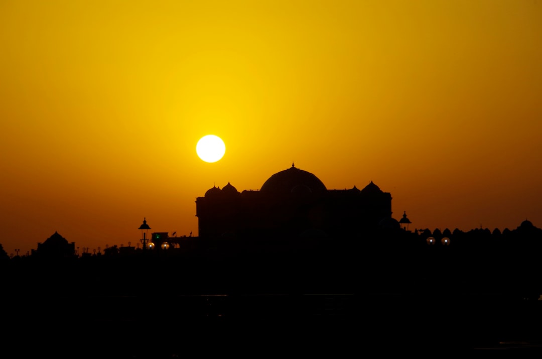 silhouette of dome building during golden hour
