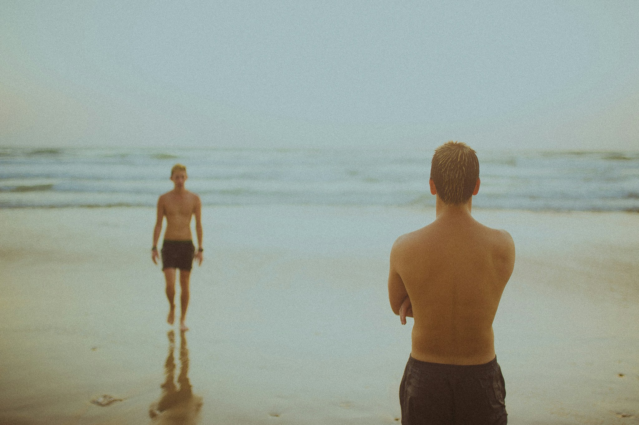 Man enjoying a walk during vacation on beach shore