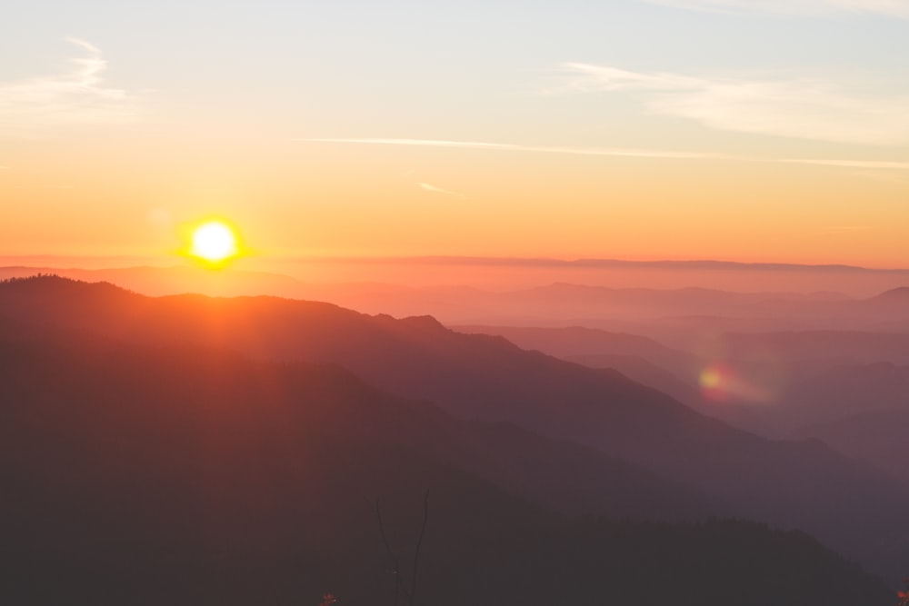 silhouette of mountain during golden hour