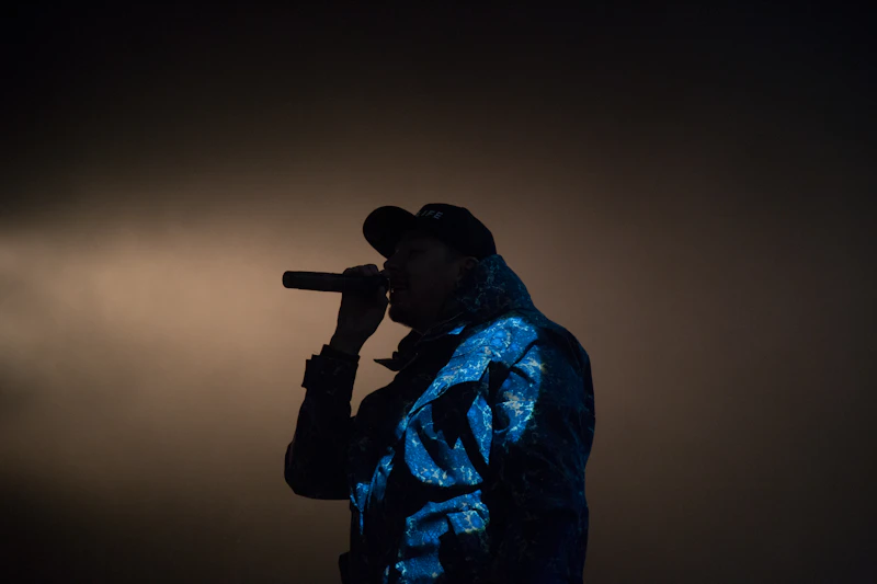 Silhouette of a vocalist with a microphone