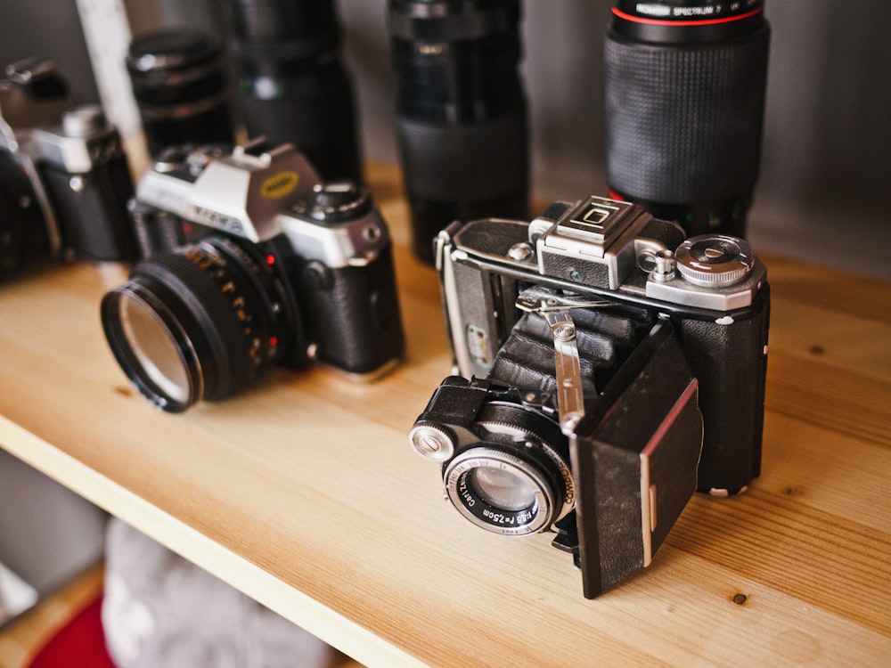 photo of two black cameras