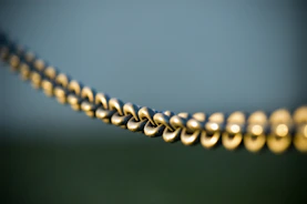 tilt shift photography of gray steel chains