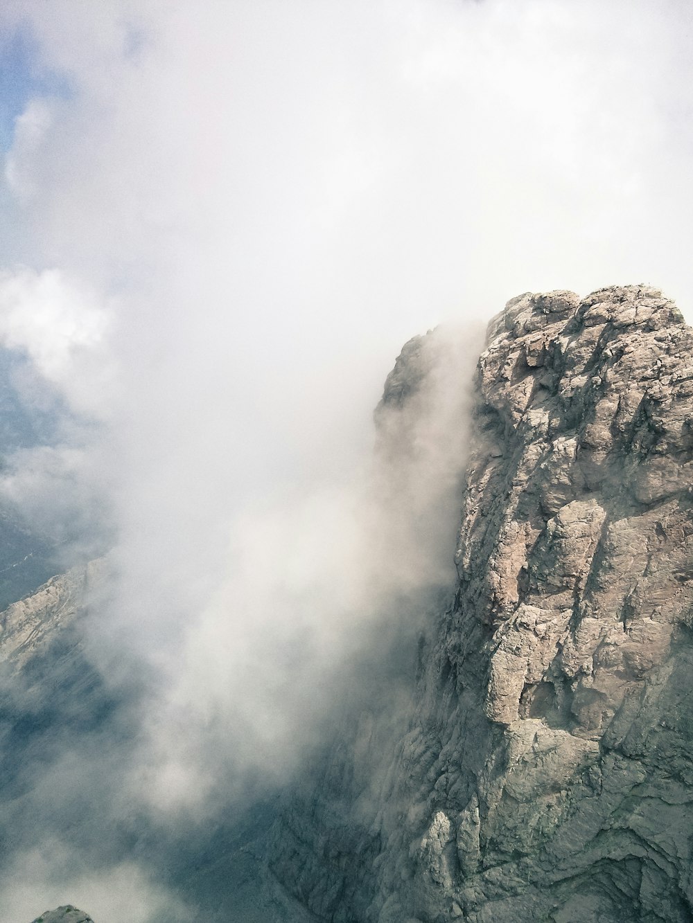 aerial view of mountains and fogs