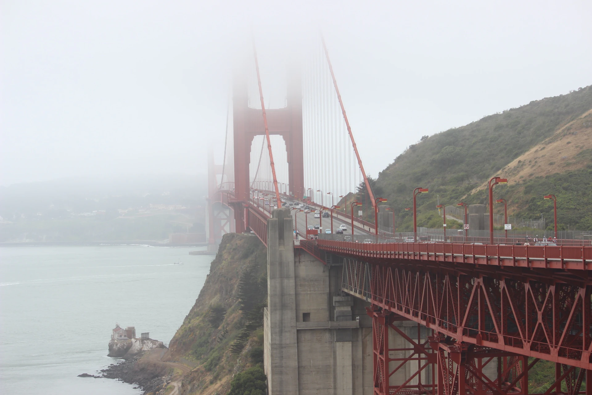 San Francisco, Golden Gate surrounded by fog during daytime