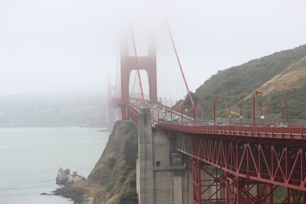 San Francisco, Golden Gate surrounded by fog during daytime