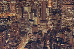 aerial photography of city buildings with lights