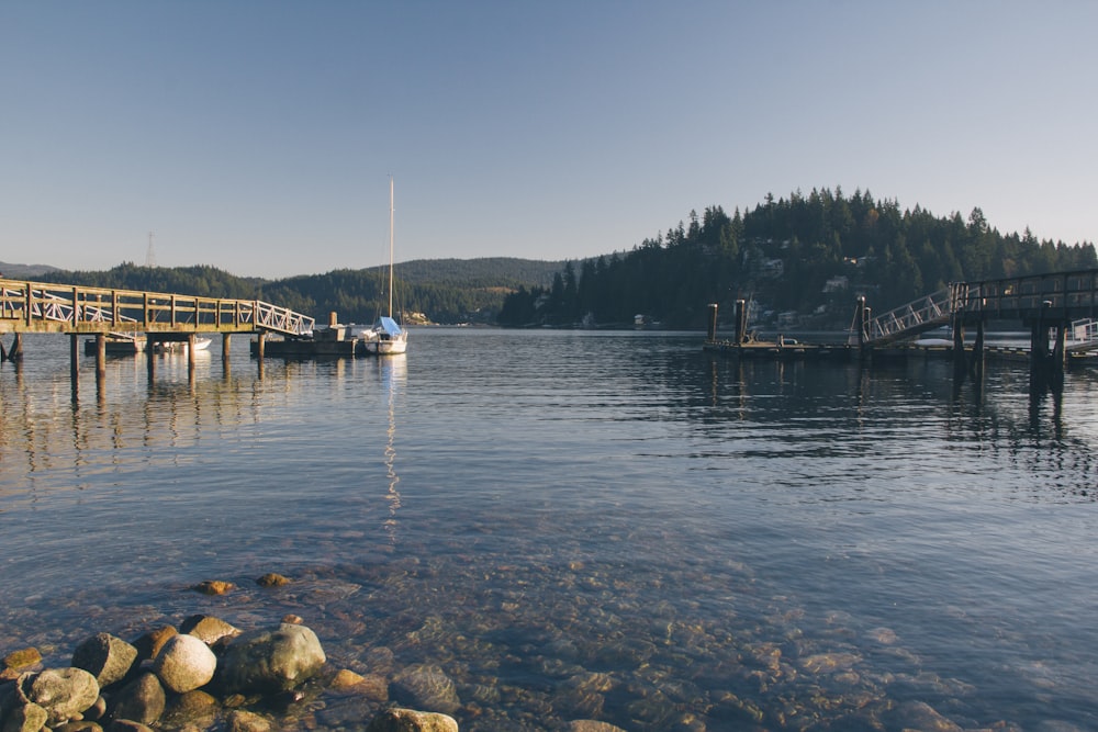 body of water with wooden docks during daytime