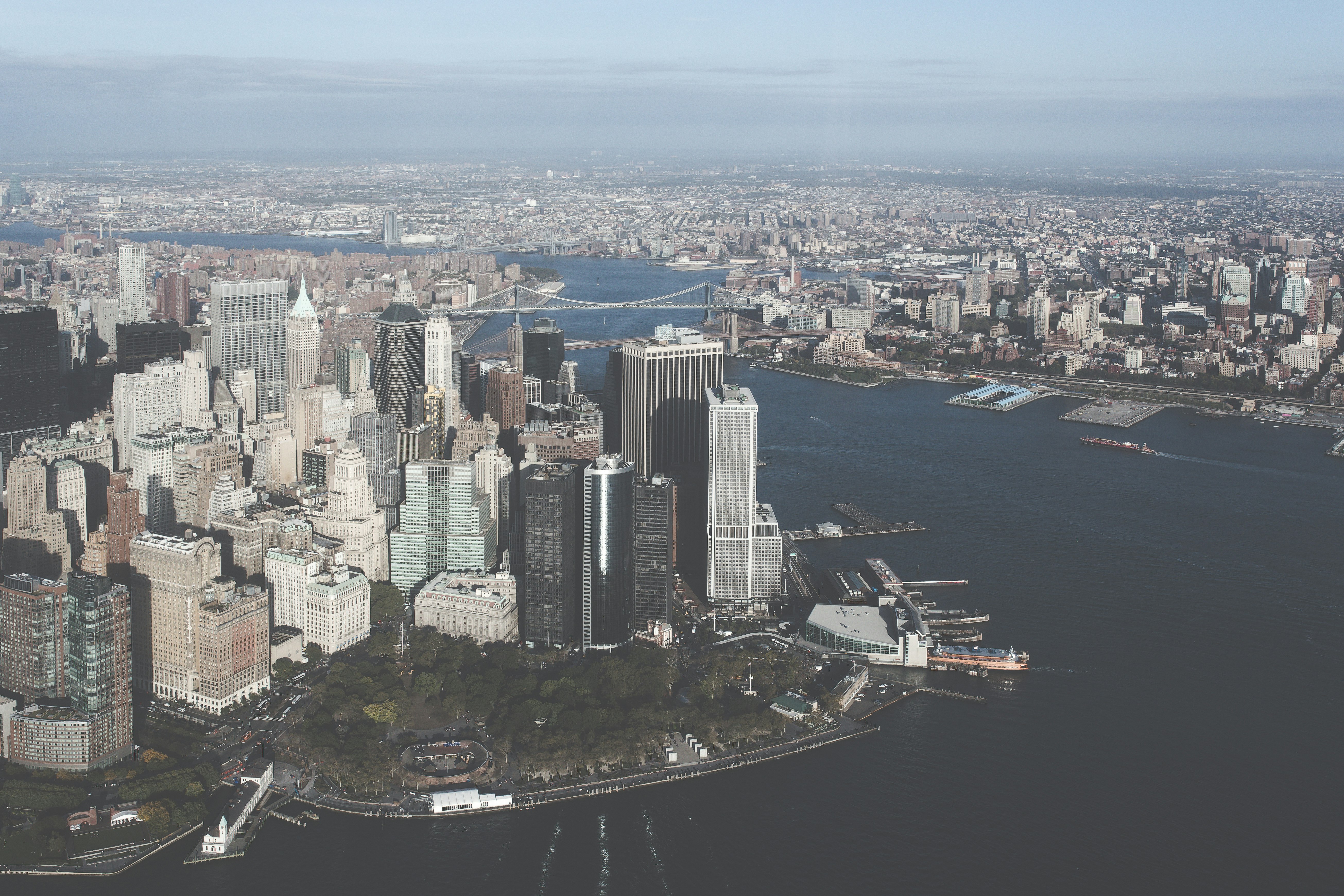 aerial view of buildings near body of water