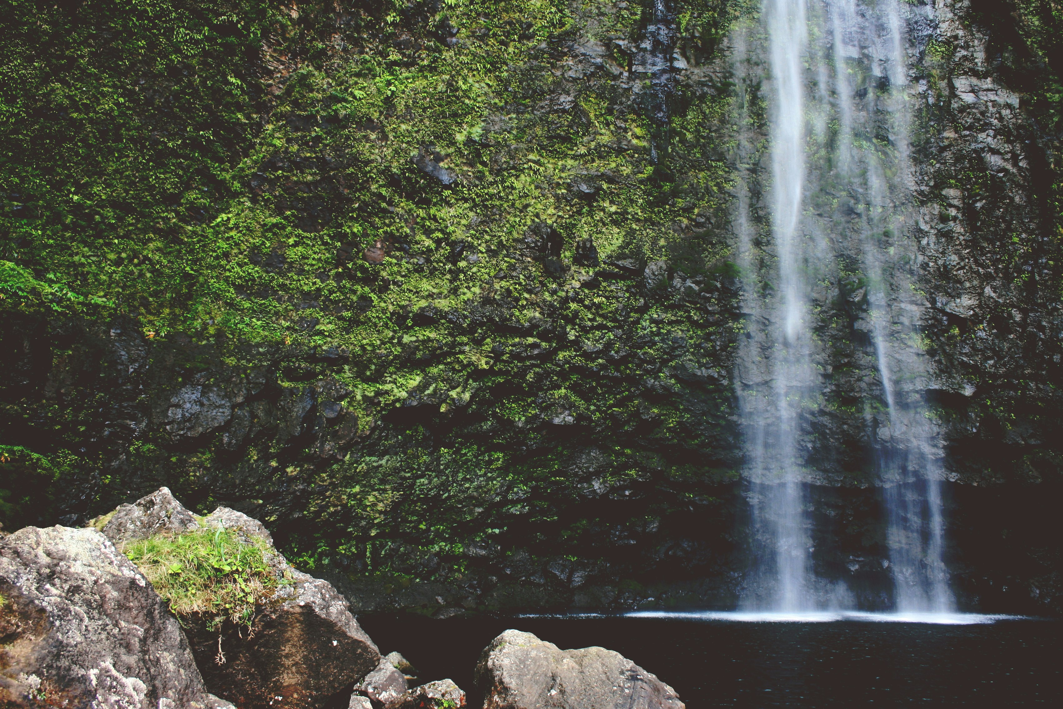 rock near waterfall