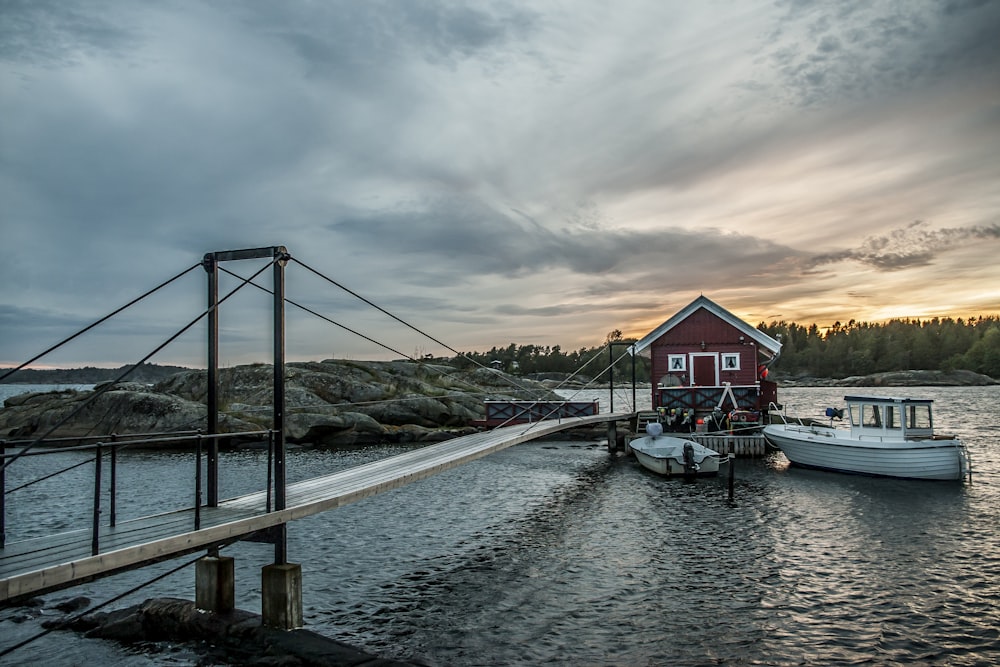 white boat near red and gray structure