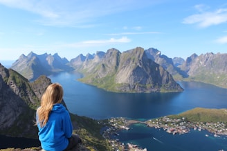 woman sitting on a cliff