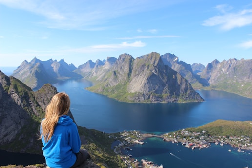 woman sitting on a cliff