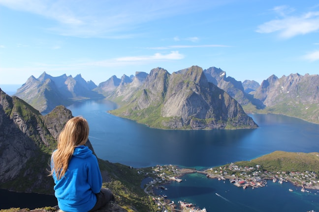 woman sitting on a cliff