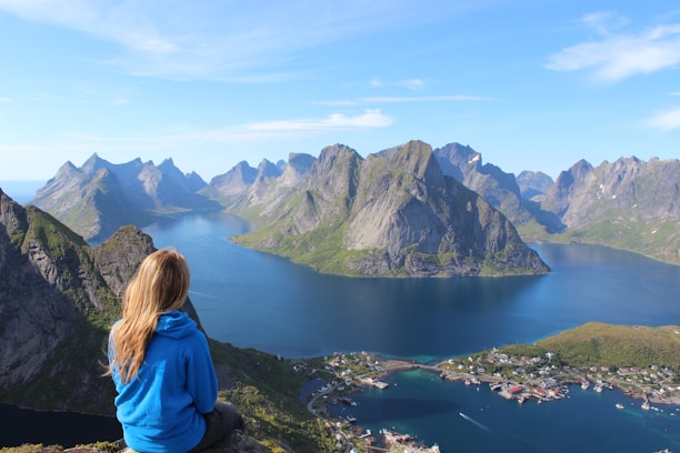 woman sitting on a cliff